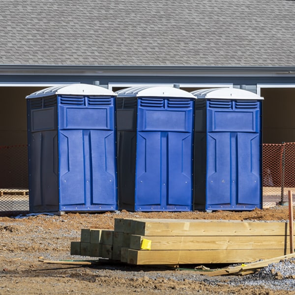 what is the maximum capacity for a single portable toilet in Hulbert MI